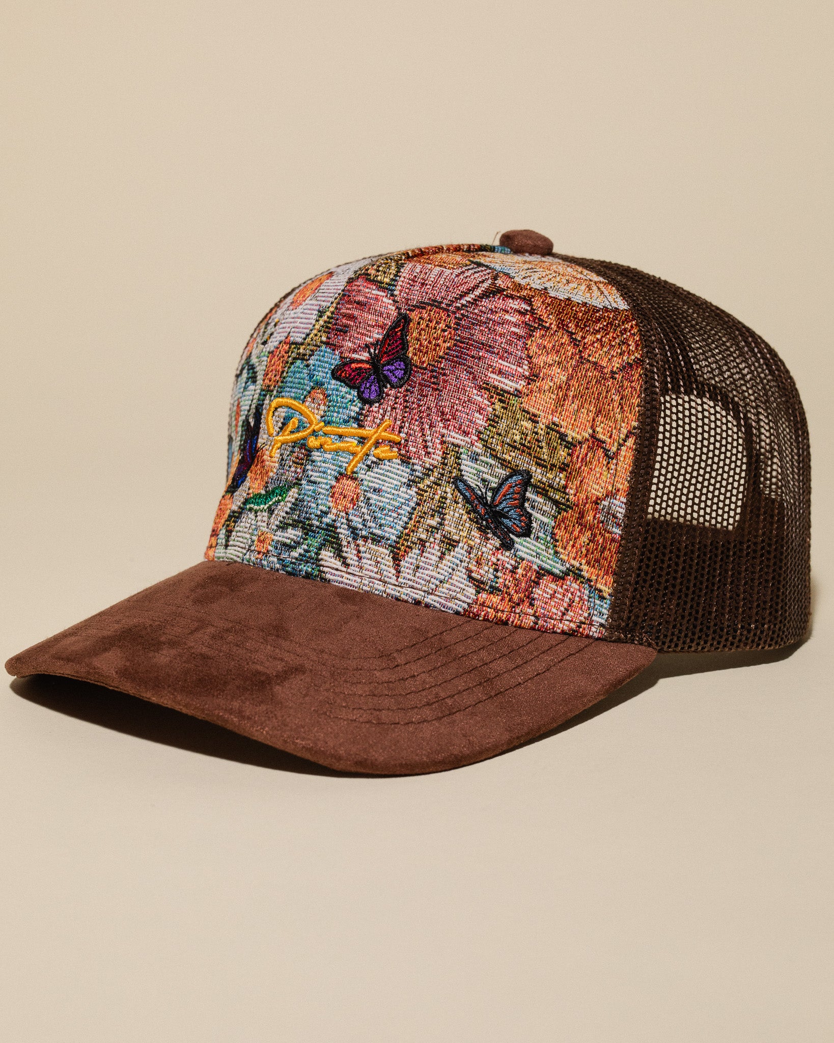 Pirate “Ideas in Transit” Bloom Tapestry Trucker Hat (Brown)