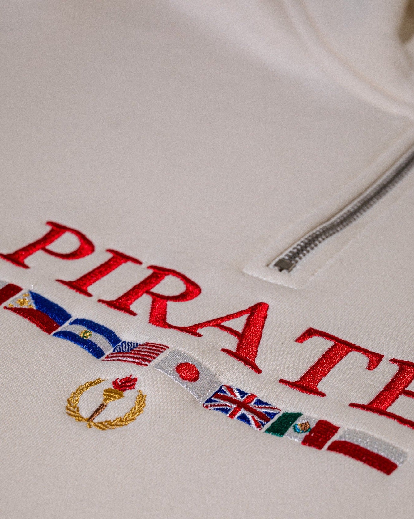 Pirate Worldwide Flags Quarter Zip (Cream)