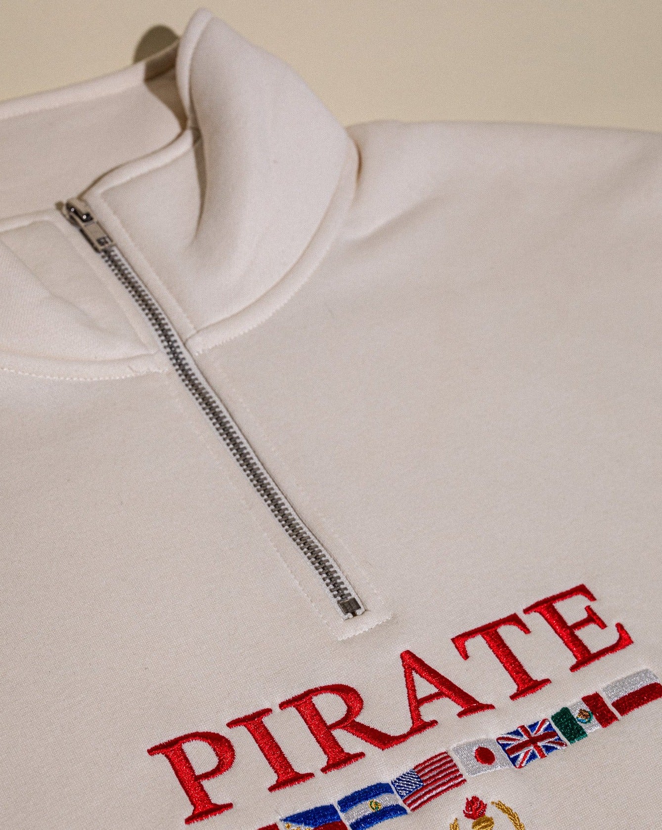 Pirate Worldwide Flags Quarter Zip (Cream)