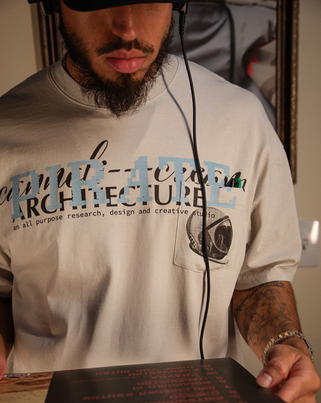 Pirate Cannoli Cream Arch Pocket Tee (Cement)