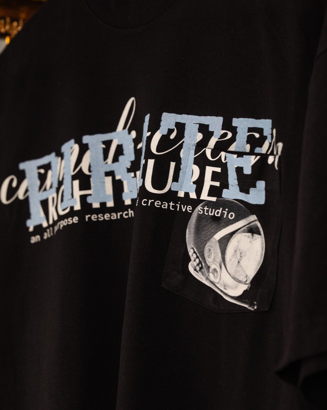 Pirate Cannoli Cream Arch Pocket Tee (Black)