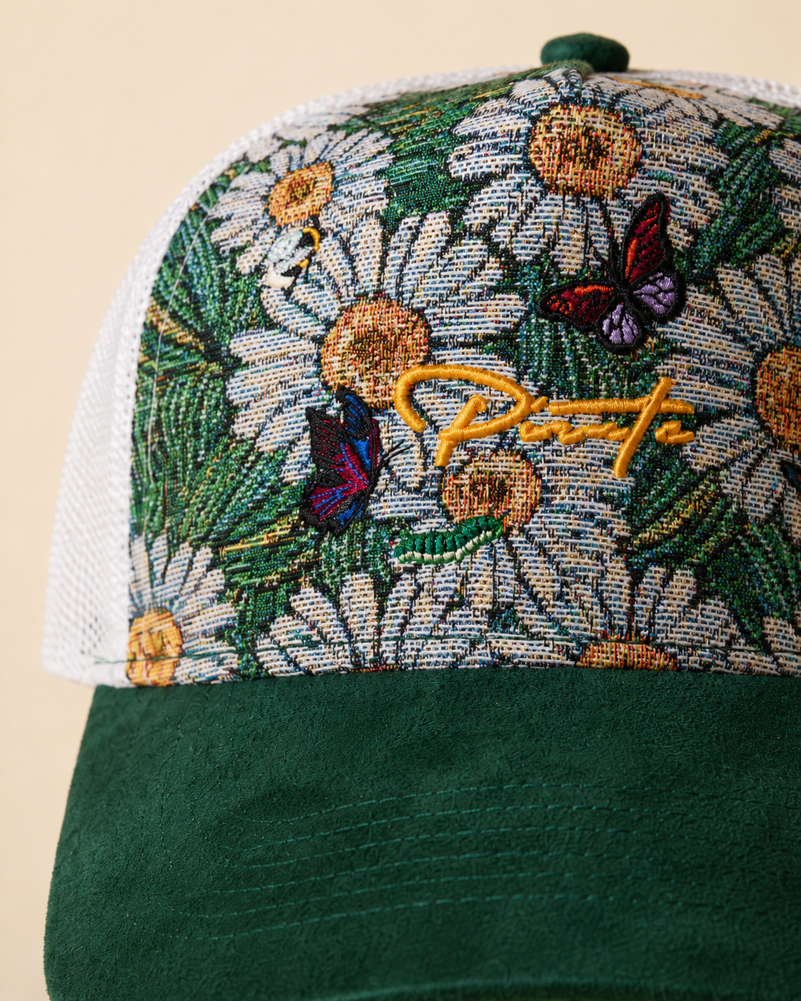 Pirate “Ideas in Transit” Daisy Tapestry Trucker Hat (Forest Green / White)